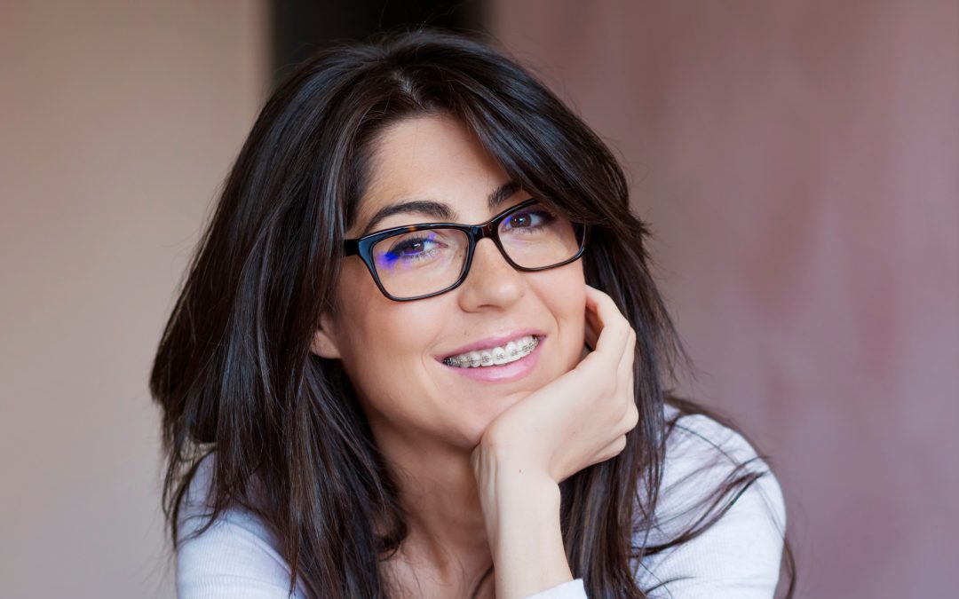 Adult woman with braces in New York NY